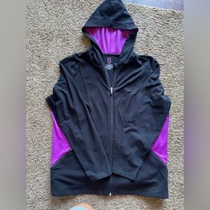 Woman’s active wear zip up hooded sweatshirt color black and purple.  Size 18/20
